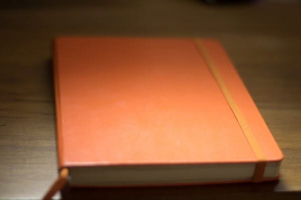 Bullet journaling with a orange Leuchtturm 1917 Dotted Medium Journal